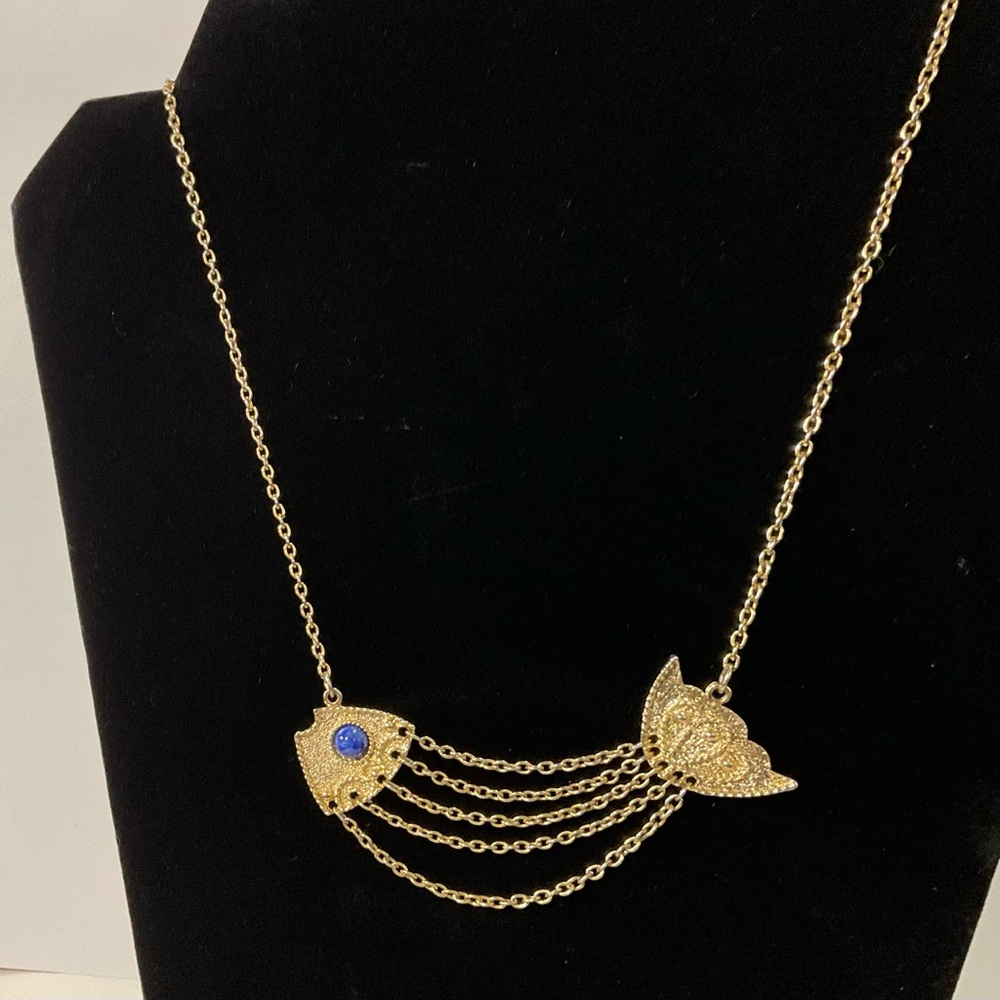 Vintage Sarah Coventry gold tone fish necklace w/ blue cabochon eye